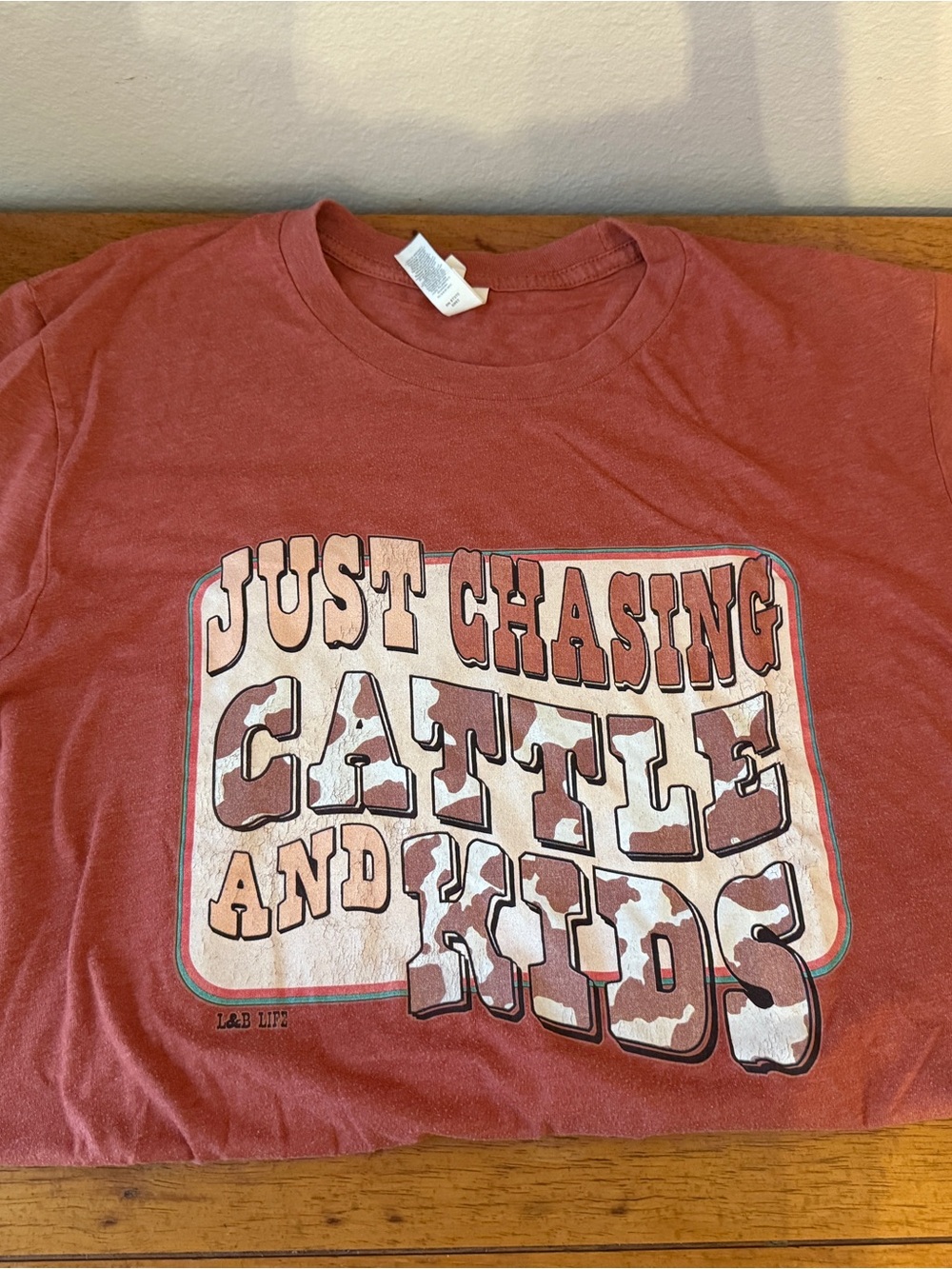 Bella Canvas Rust Red 'Just Chasing Cattle and Kids' Graphic Tee